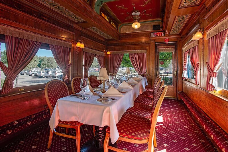 Train car with long private dining table